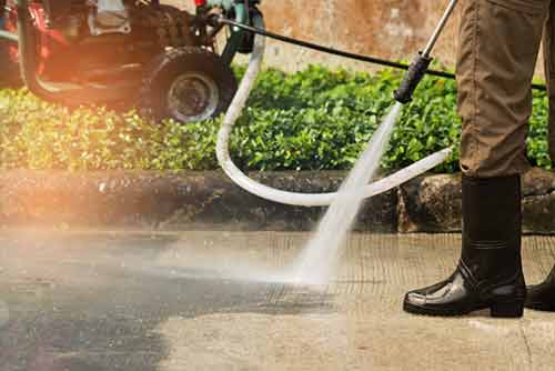 man-pressure-washing