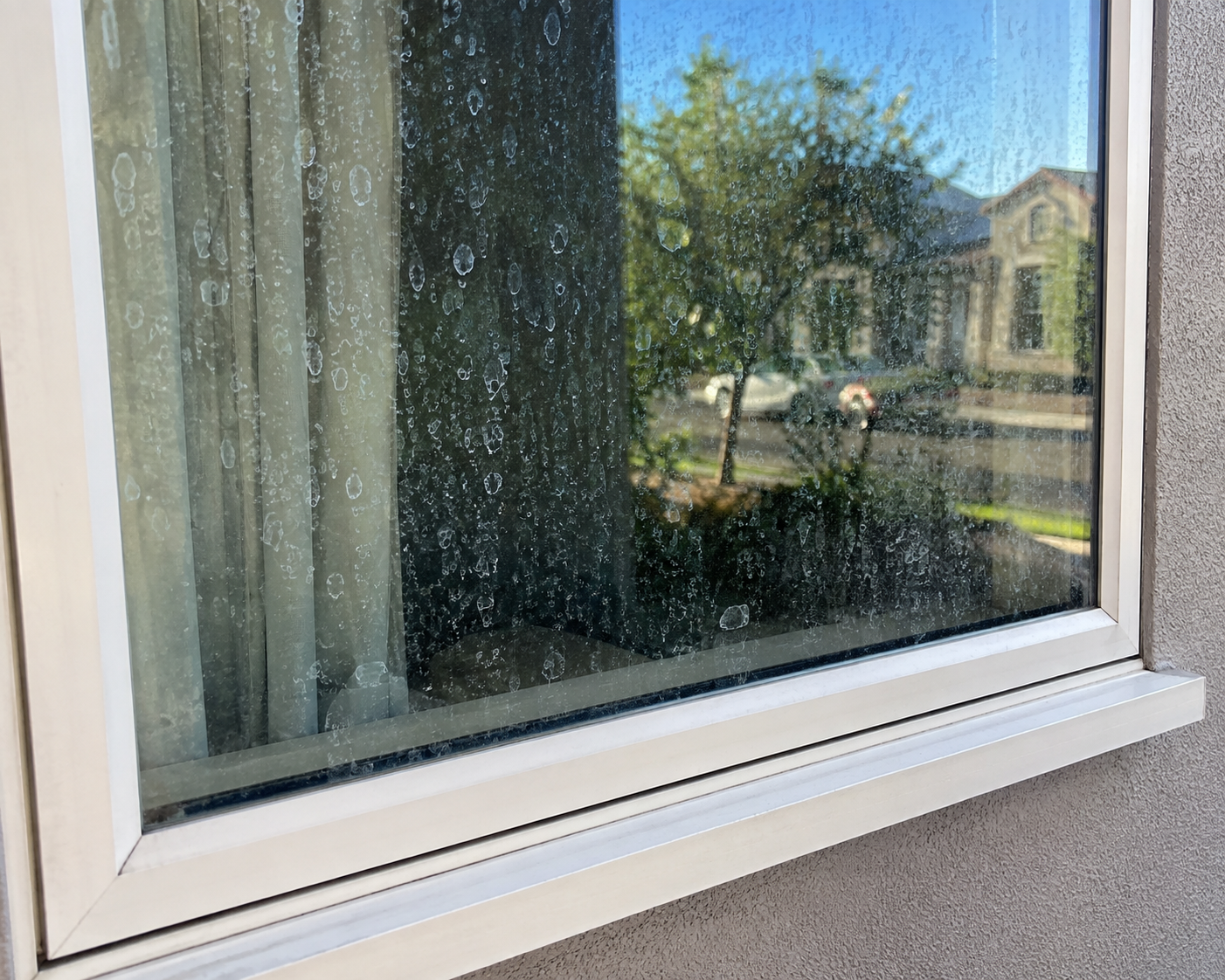 Cloudy patches that won’t wipe off