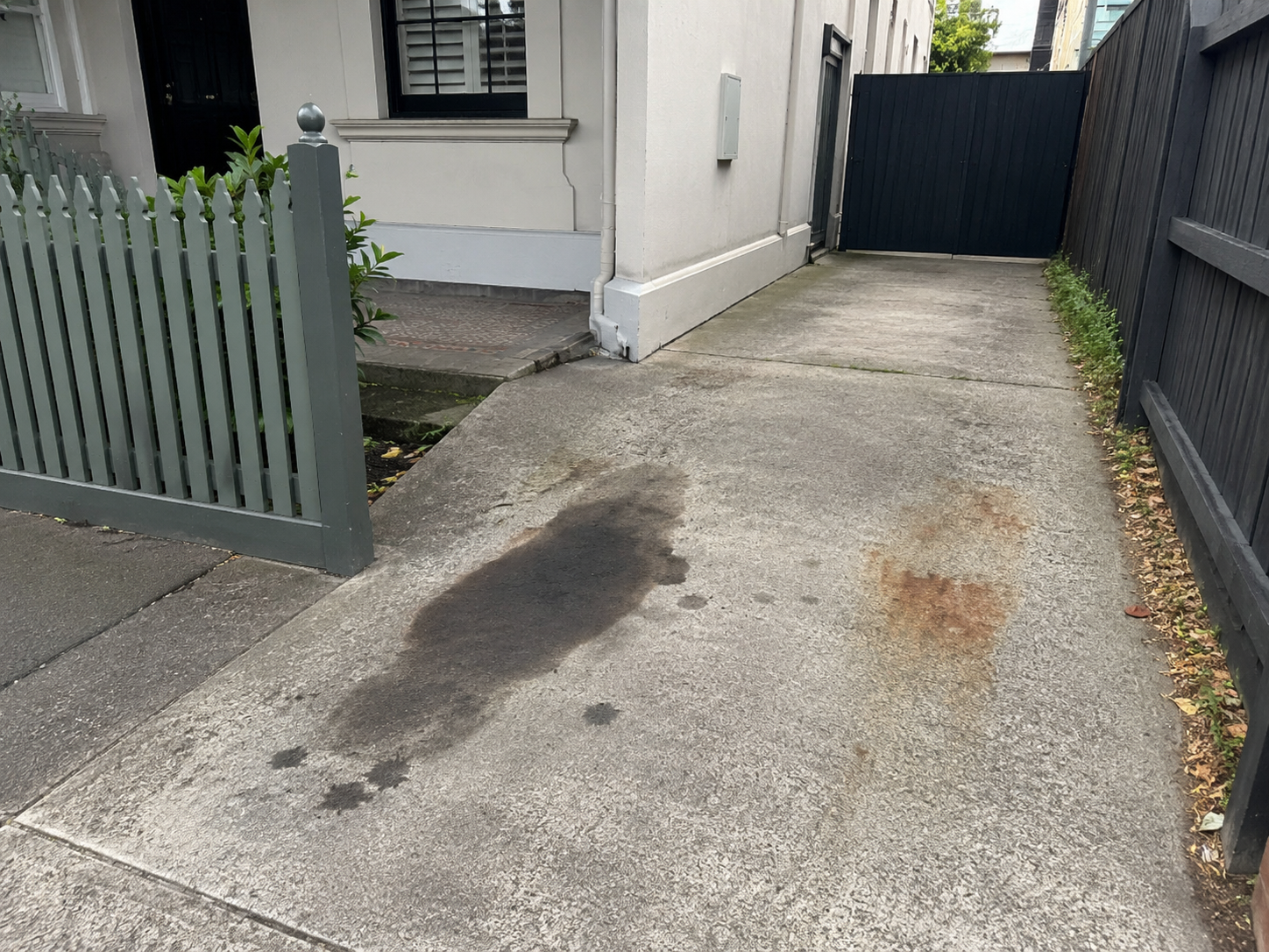 Oil and rust stains on the driveway